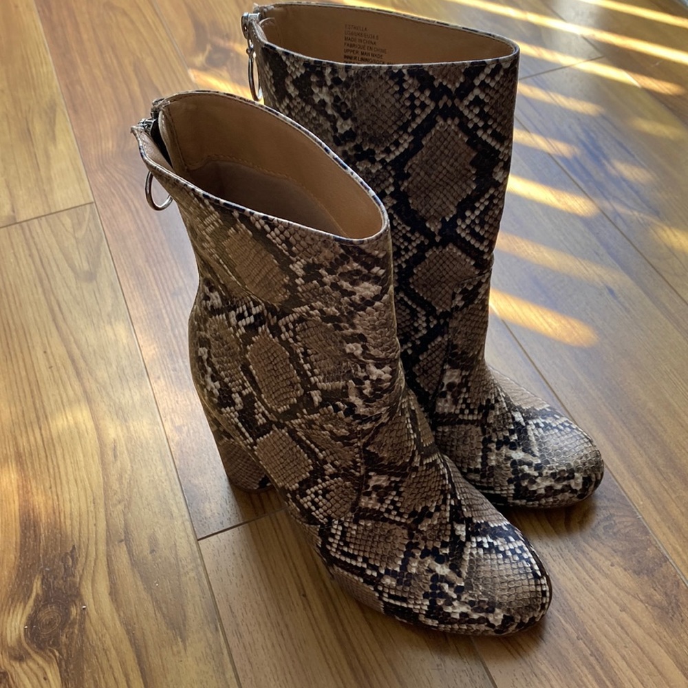 Snake skin boots size 8.
